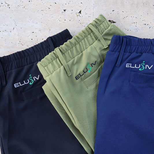 Elusiv Golf Fairway Flex Joggers Overhead Layout. Black, Olive Green and White.